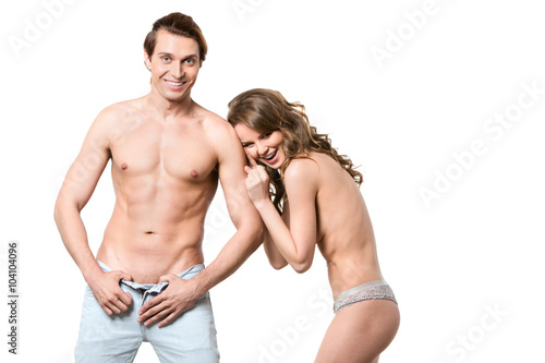 Cheerful naked couple isolated. Two lovers.