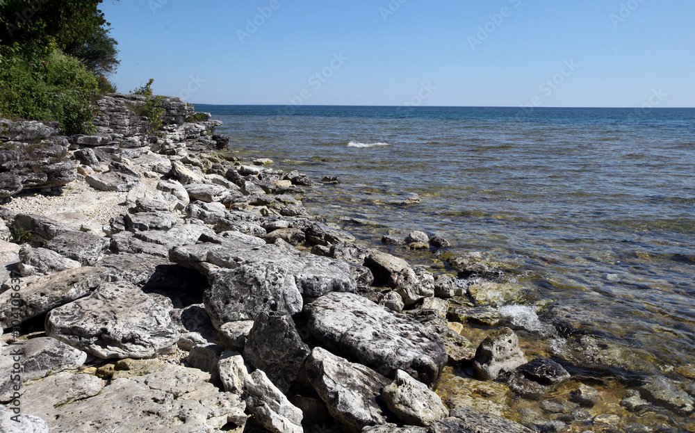 Rocky shores define the coastline of Lake Michigan at Cave Point State Park in Door County, Wisconsin.