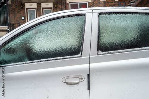 Montreal, CA, 29th February 2016. Car windows are covered with ice after freezing rain.