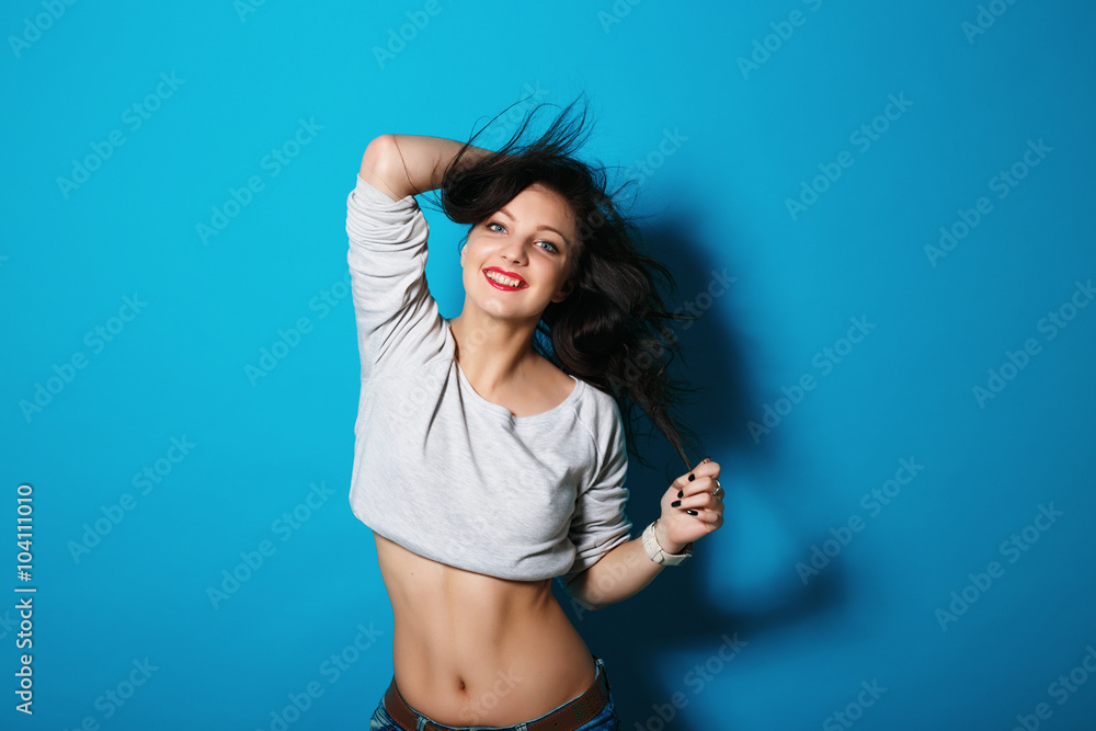Fototapeta premium Vogue sportive attractive brunette rnb girl in the studio portrait
