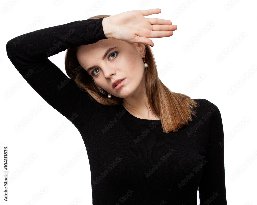 Portrait of a young woman, a hand is over the head Portrait of a young woman, a hand is over the head