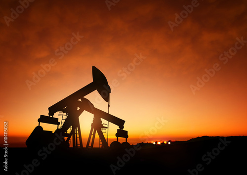 Photography Oil Pumps at Dusk. Oil pumps producing oil at dusk.