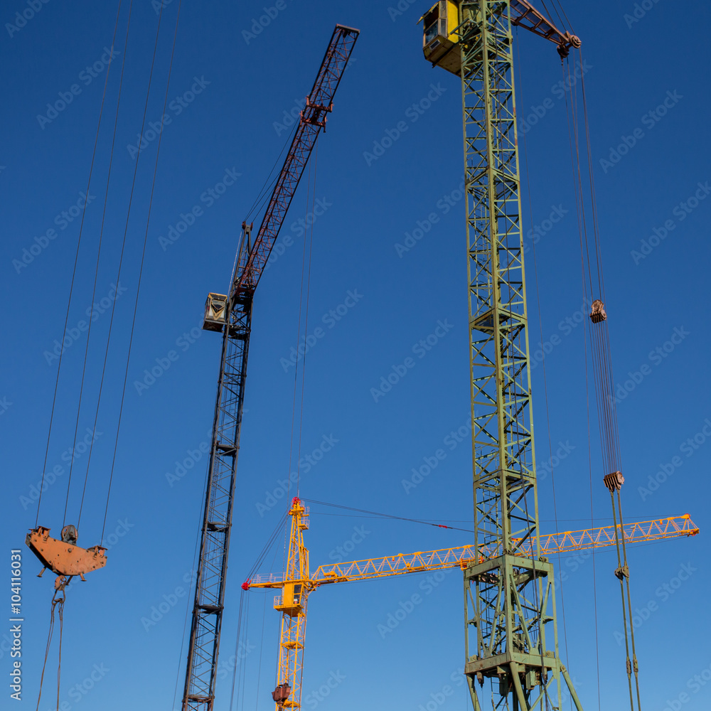 Crane construction concrete building in city Crane construction concrete building in city