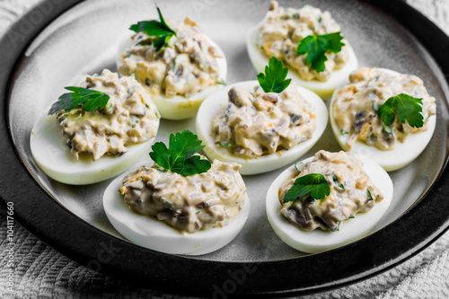 Deviled eggs with mushrooms and mayonnaise