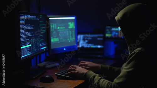 A Man Hacker at the Computer 