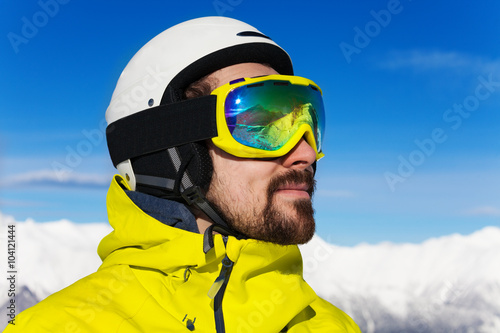 Close portrait of skier man