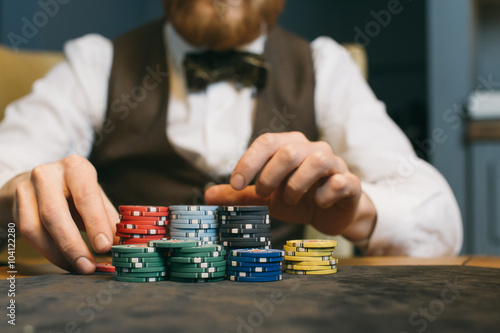 Gentleman playing poker photo