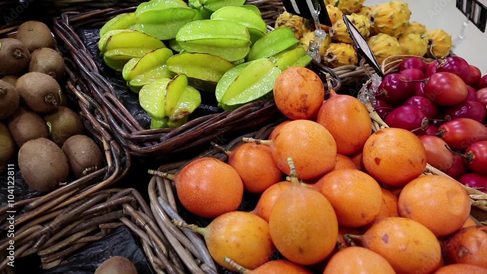 Shop counter with fresh exotic fruits. Fresh exotic fruits in
