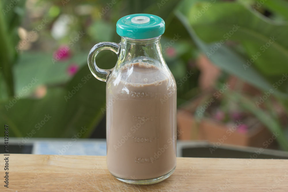 Chocolate milk in glass bottle Stock Photo Adobe Stock