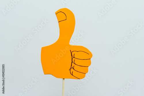 eva foam thumbs up on white background