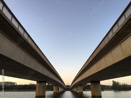 Commonwealth bridge flying over lake burley griffin photo