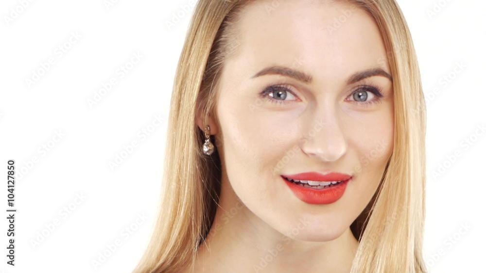Attractive woman in beautiful dress smiling, on white, close up Attractive woman in beautiful dress smiling, on white, close up