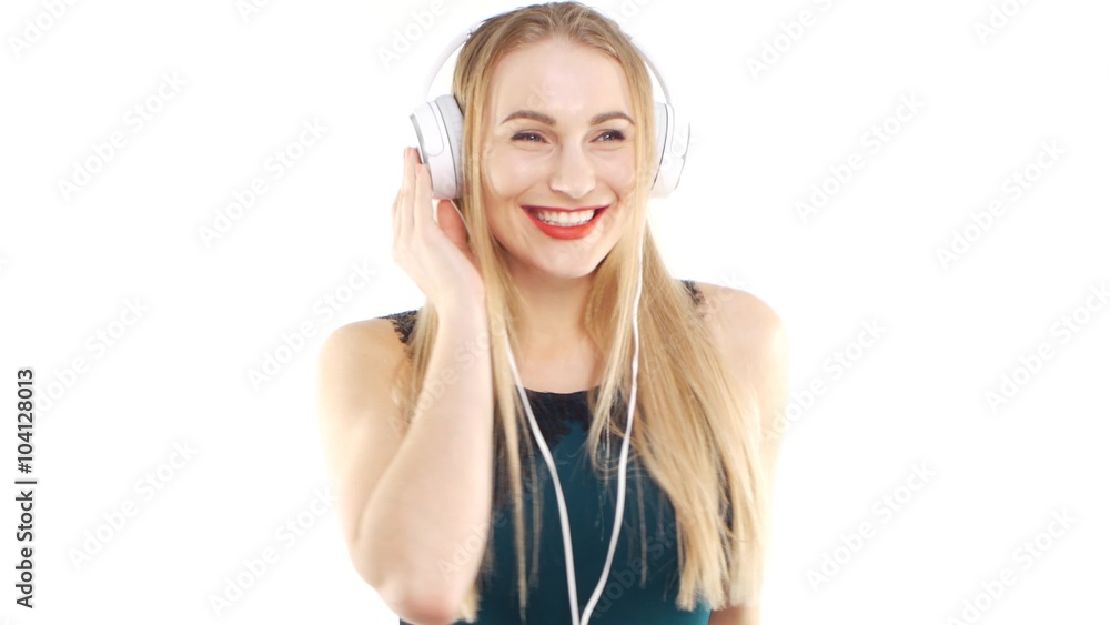 Beautiful girl wearing headphones and dancing Beautiful girl wearing headphones and dancing