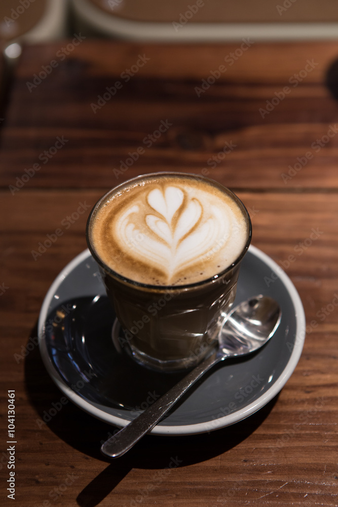 hot coffee latte with latte art on top hot coffee latte with latte art on top