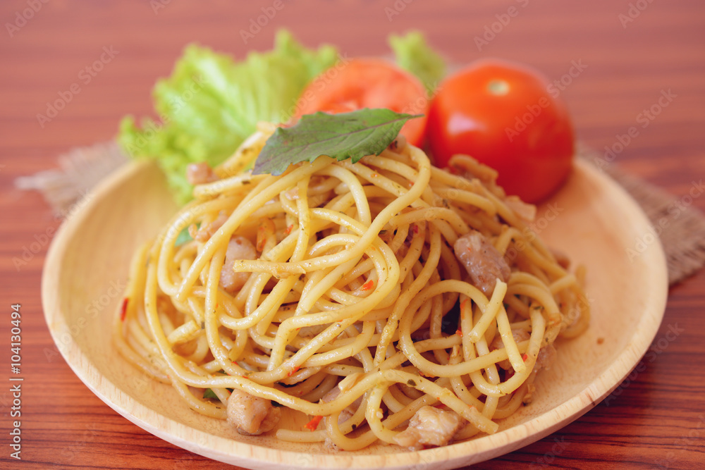 Stir-fried spicy spaghetti with chicken. Thai style