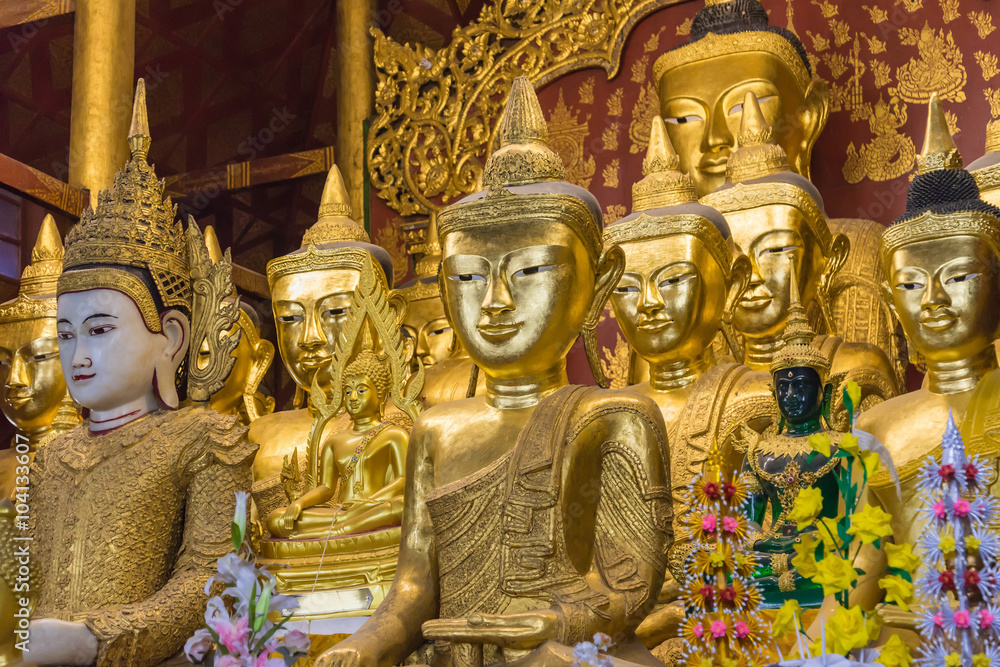 Golden Buddha inside temple in mandalay Myanmar