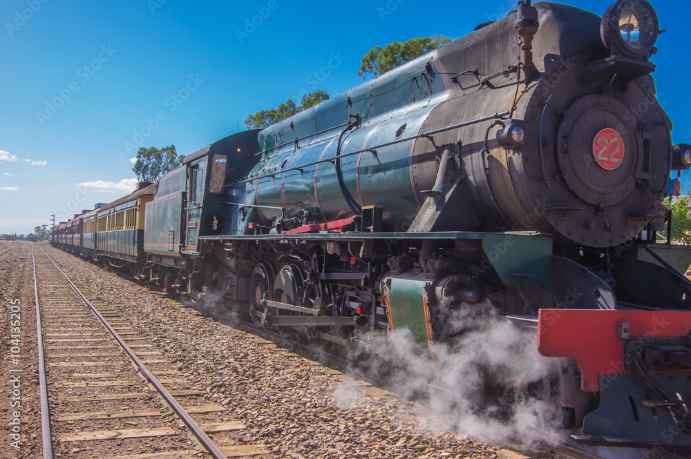 Naklejka premium A restored steam engine Locomotive still journeys in outback South Australia