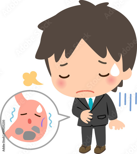胃もたれに悩むビジネスマン