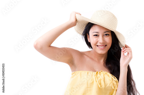 happy, smiling beautiful woman wearing hat in summer dress