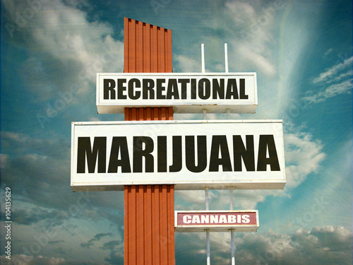 aged and worn vintage recreational marijuana sign