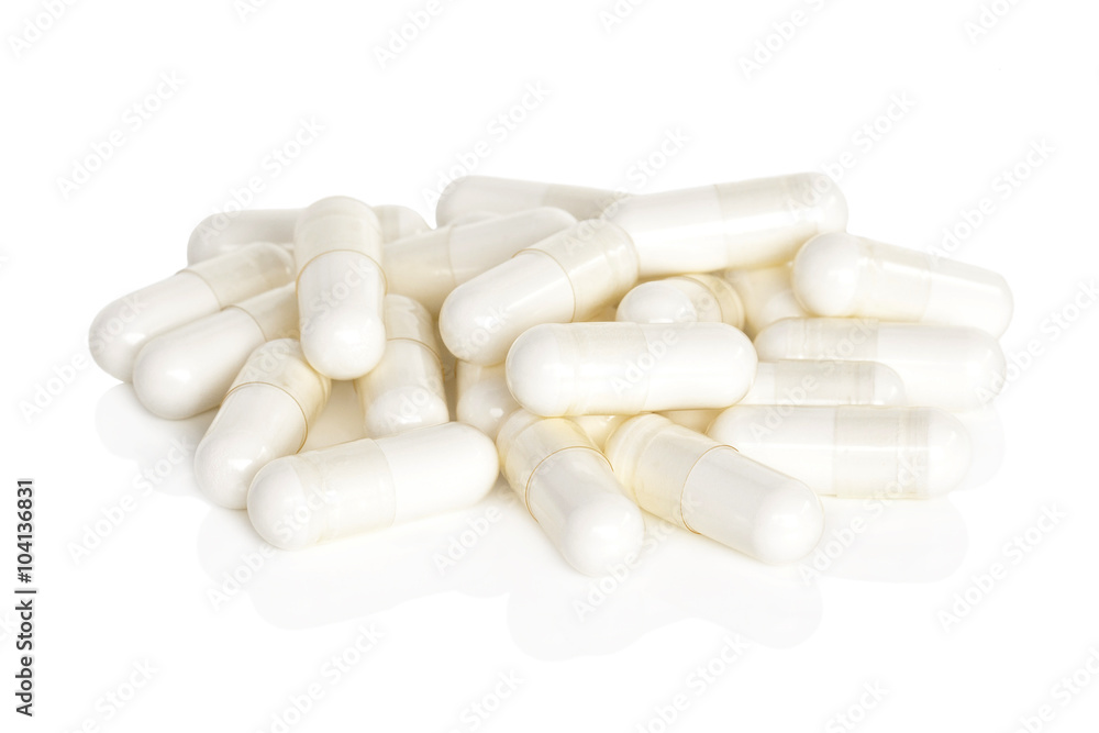 Magnesium Vitamin Supplements. A pile of magnesium supplement capsules isolated on a white background. Magnesium Vitamin Supplements. A pile of magnesium supplement capsules isolated on a white background.