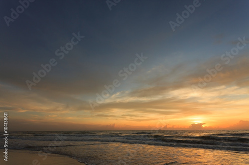 sunset dramatic sky with colorful cloud on the beach © sutichak
