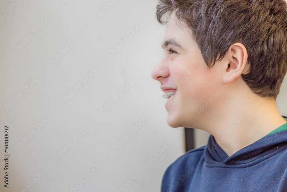 Boy smiling with braces Boy smiling with braces