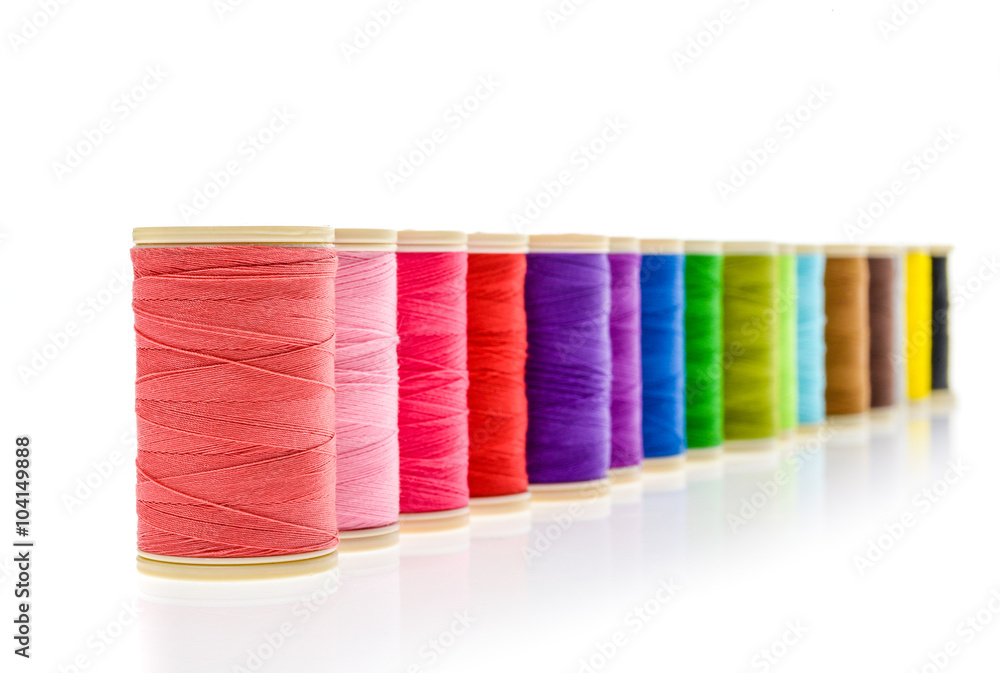 Different color Sewing Threads on a roll. Different color Sewing Threads on a roll.
