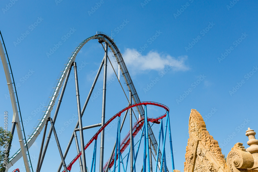 Roller Coaster in Amusement Entartainment Theme Park Roller Coaster in Amusement Entartainment Theme Park