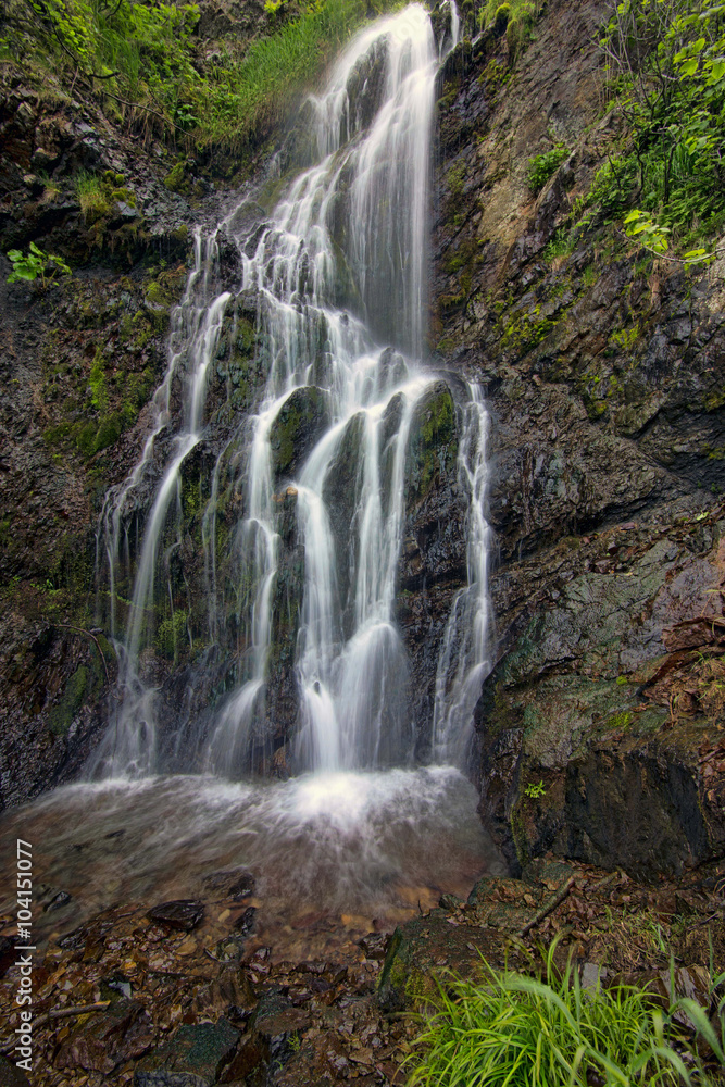 the waterfall among the rocks