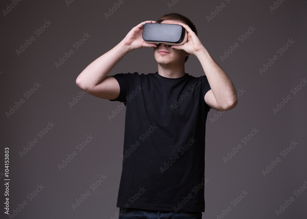 Man wearing virtual reality glasses Man wearing virtual reality glasses