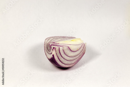 Slice peeled purple onion