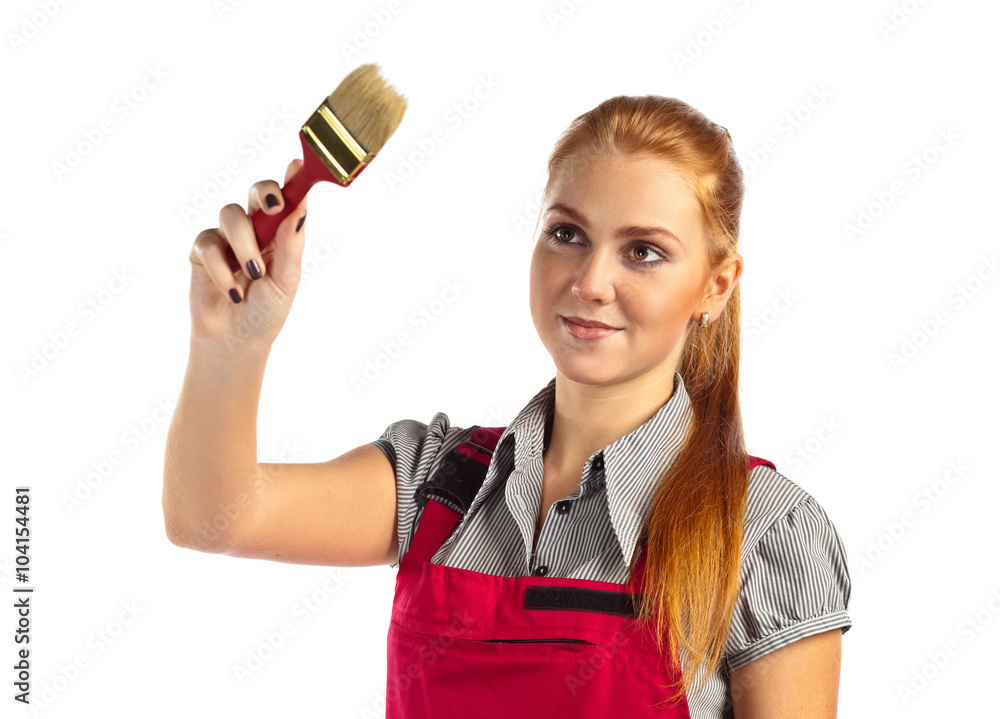 woman in red jumpsuit with paint brush woman in red jumpsuit with paint brush