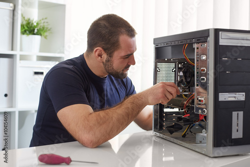 Man repairing computer
