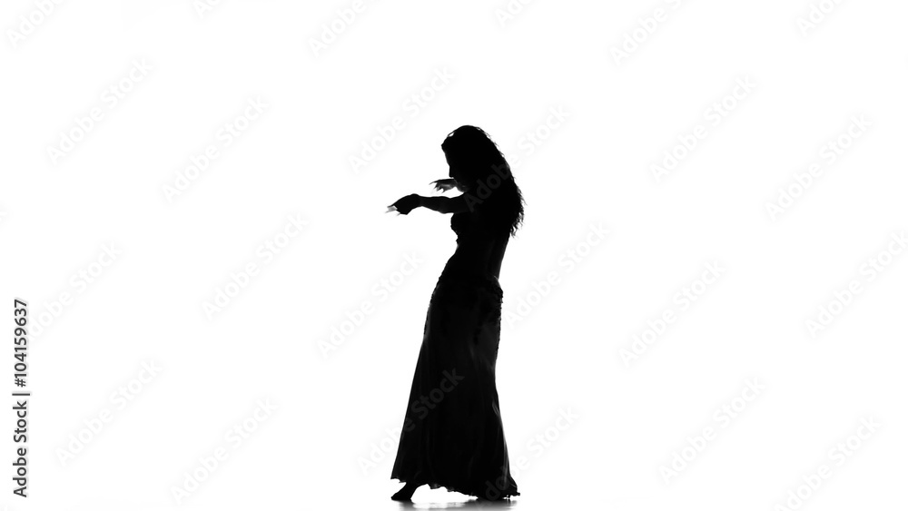 Exotic belly dancer woman dance on white, silhouette Exotic belly dancer woman dance on white, silhouette