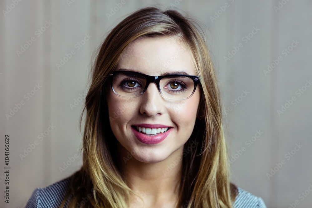 Pretty blonde woman smiling at camera Pretty blonde woman smiling at camera