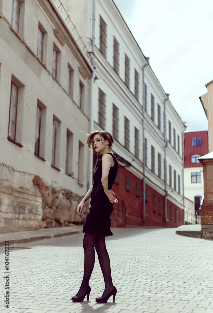 Vogue model in the black dress outdoor portrait Vogue model in the black dress outdoor portrait