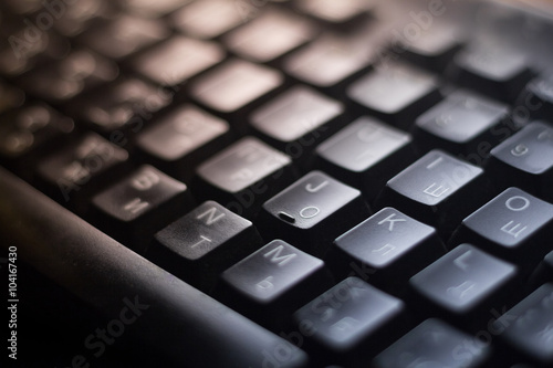 Black button on a computer keyboard