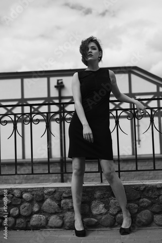 Vogue model in the black dress outdoor portrait
