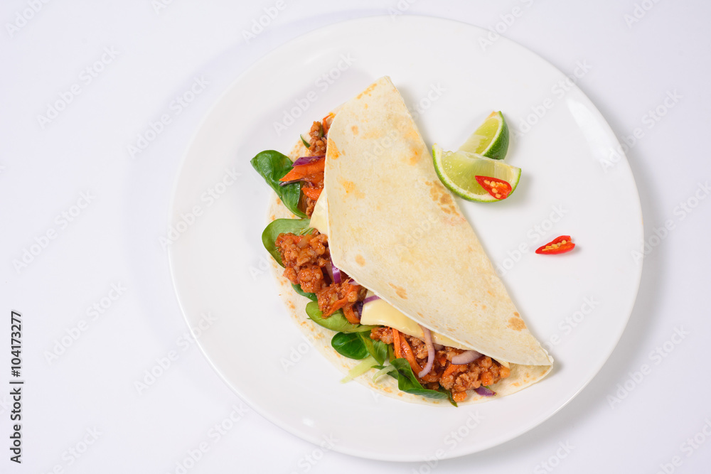 Tacos on a white plate