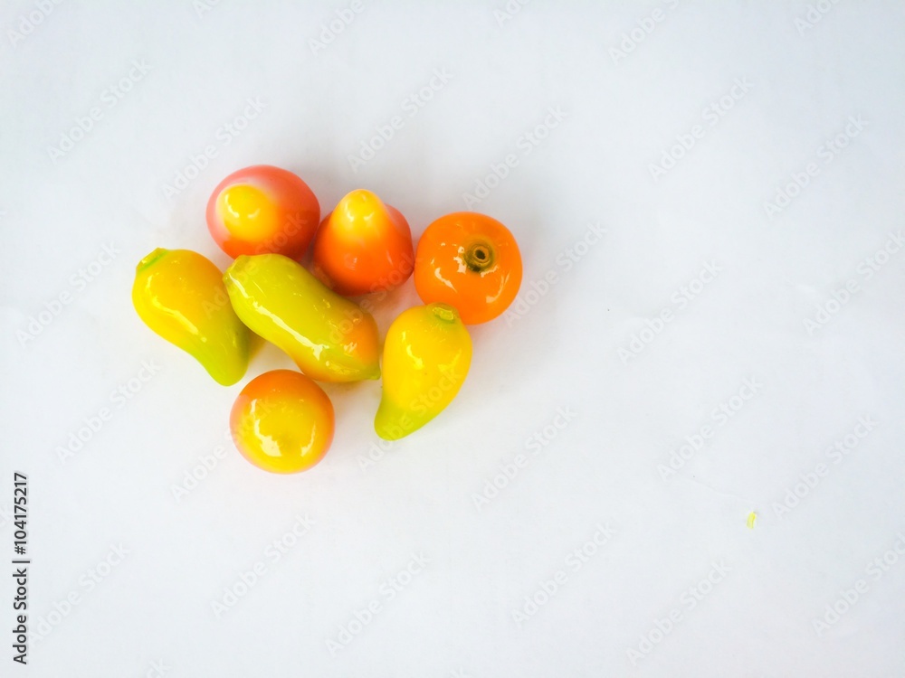 selective focus of deletable imitation fruits isolated on white background, soft focus of deletable imitation fruits selective focus of deletable imitation fruits isolated on white background, soft focus of deletable imitation fruits