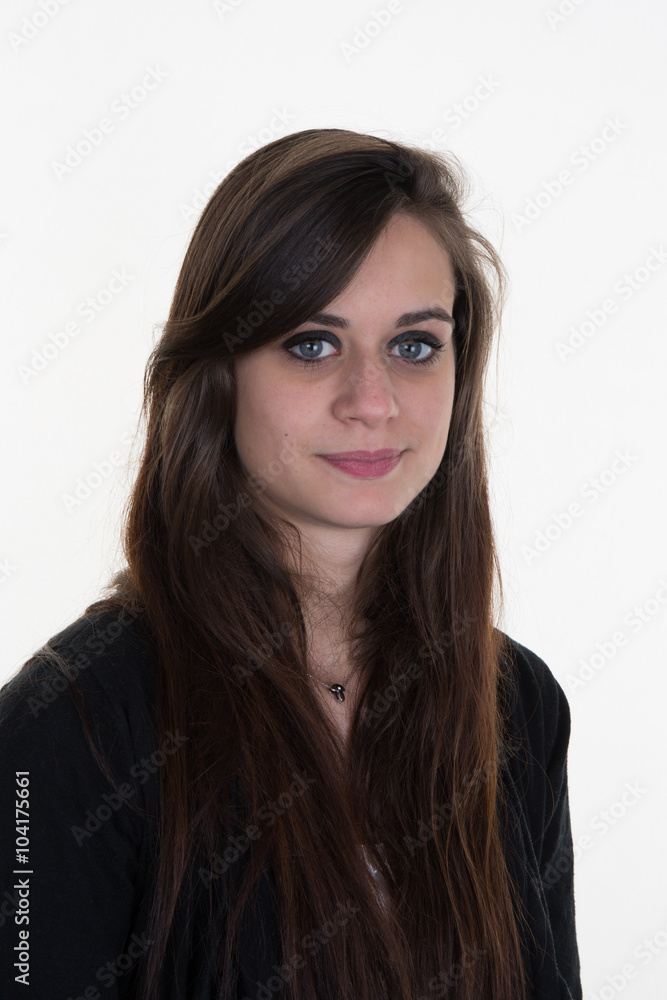 Serious young woman without makeup on a white background Serious young woman without makeup on a white background