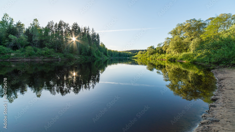 Summer river with reflections