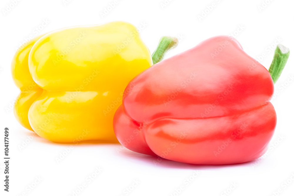 Red and yellow bell peppers isolated on the white background with clipping path Red and yellow bell peppers isolated on the white background with clipping path