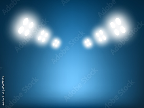 Blue background with spotlights. Vector illustration.