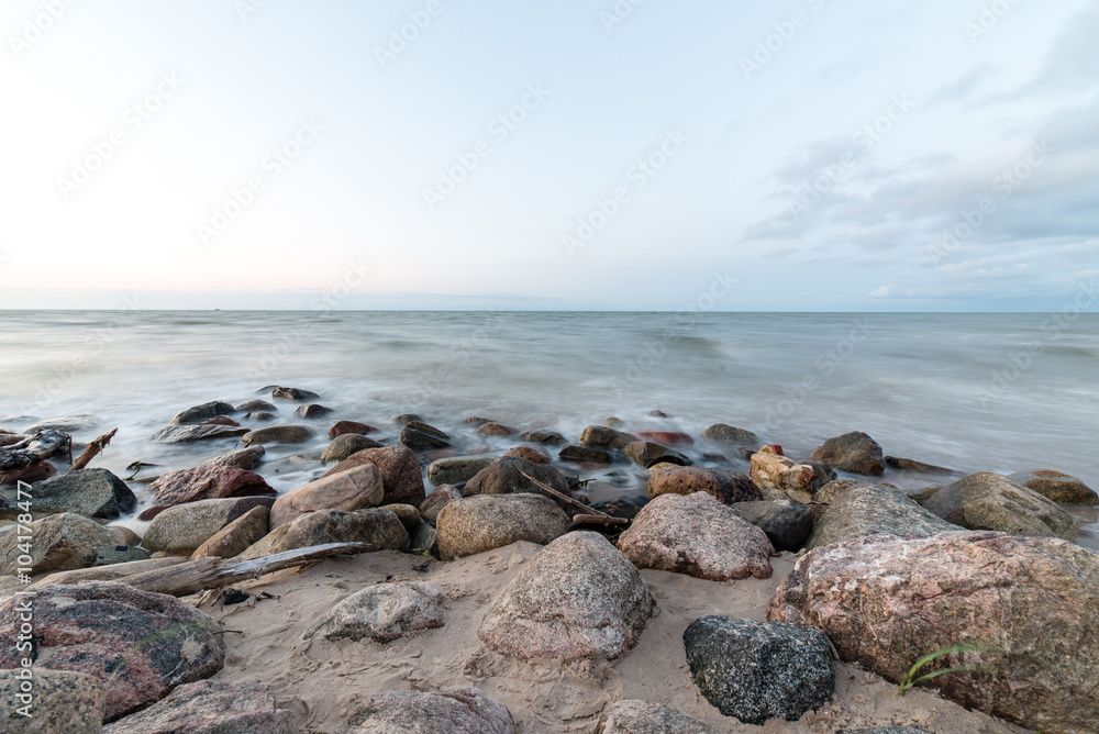 Rocky beach with clouds