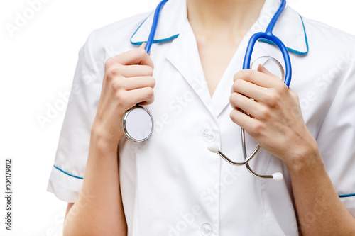 Woman doctor standing on white background