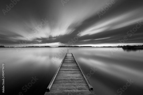 Obraz na płótnie Jetty on a lake in black and white