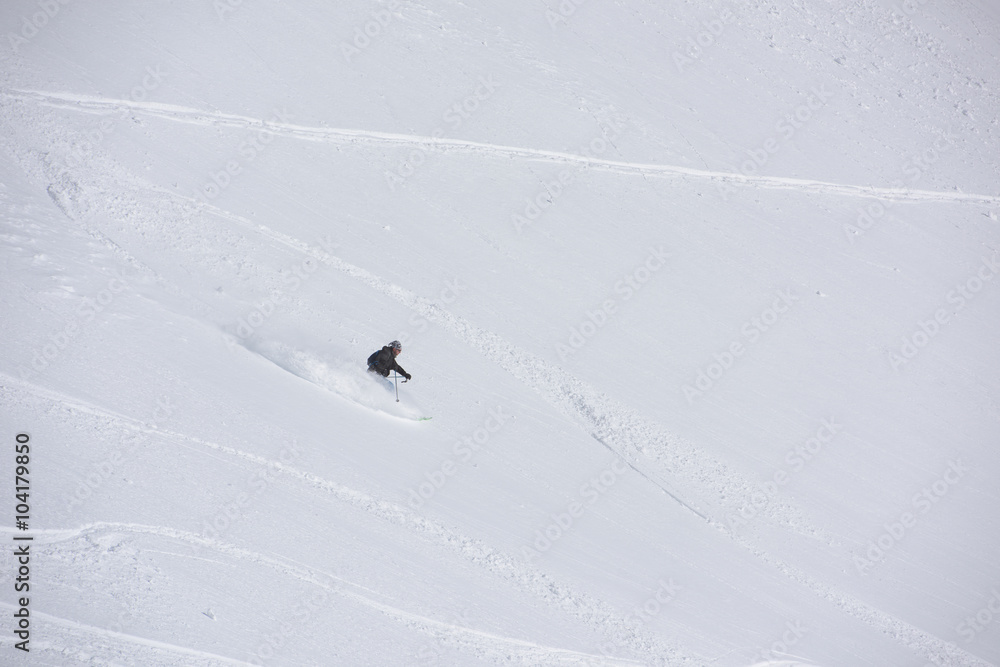 freeride skier skiing in deep powder snow freeride skier skiing in deep powder snow
