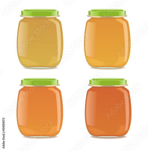 Four glass jars with baby food